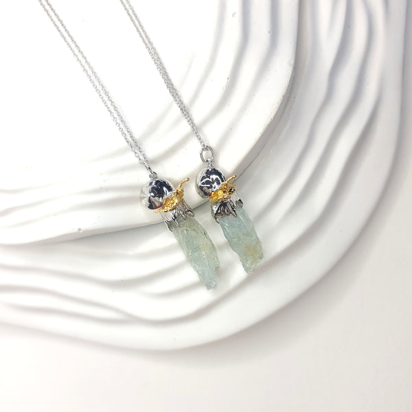Sea Snail and Raw Aquamarine