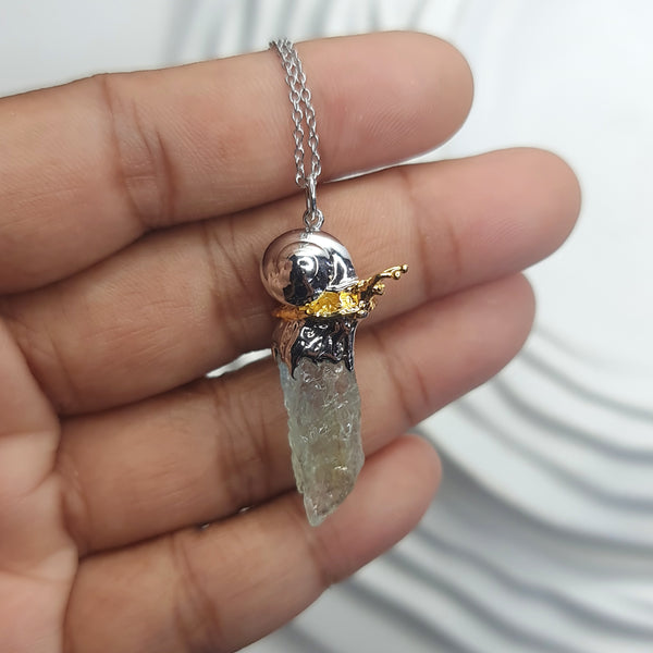 Sea Snail and Raw Aquamarine