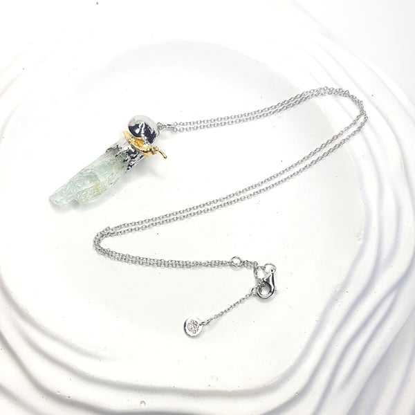 Sea Snail and Raw Aquamarine