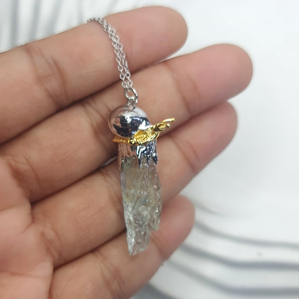 Sea Snail and Raw Aquamarine